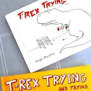 2 hard covered books: T-Rex comic